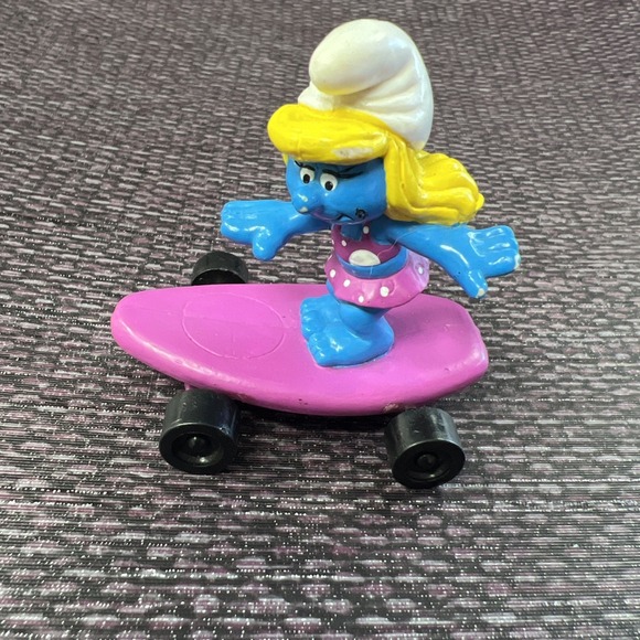 hardees Other - Hardees Kids Meal Toy 1990 Smurfs - Smurfette on Purple Skateboard